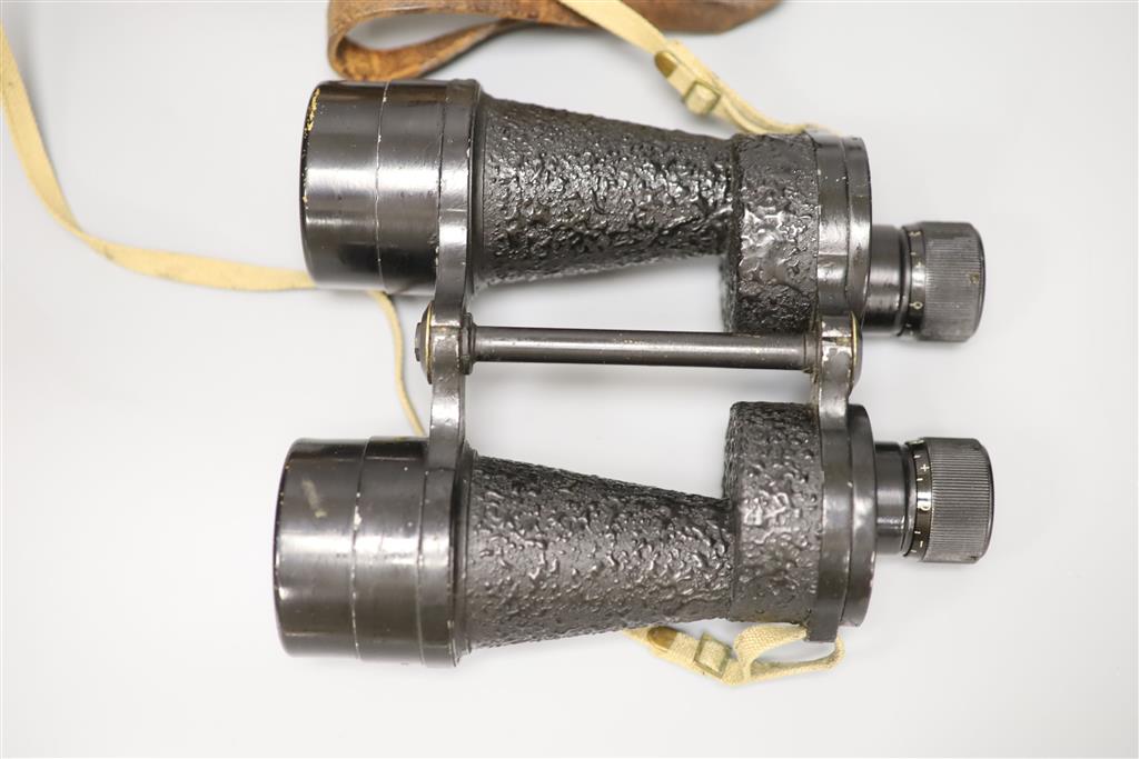 A pair of Bino Prism Mark IV x 7 register number 49604 WW2 binoculars in leather case